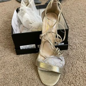 Champagne colored heels. Size 9.